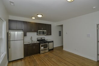 4911 W Cuyler Ave, Unit K03J in Chicago, IL - Foto de edificio - Building Photo