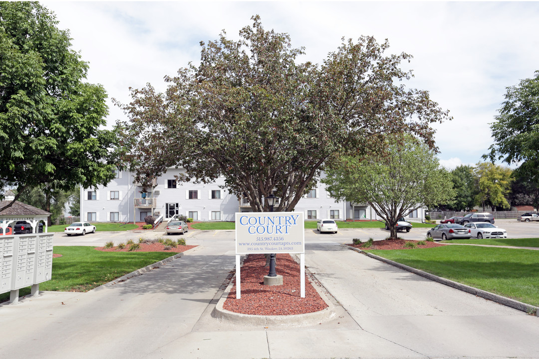 Country Court Apartments in Waukee, IA - Building Photo