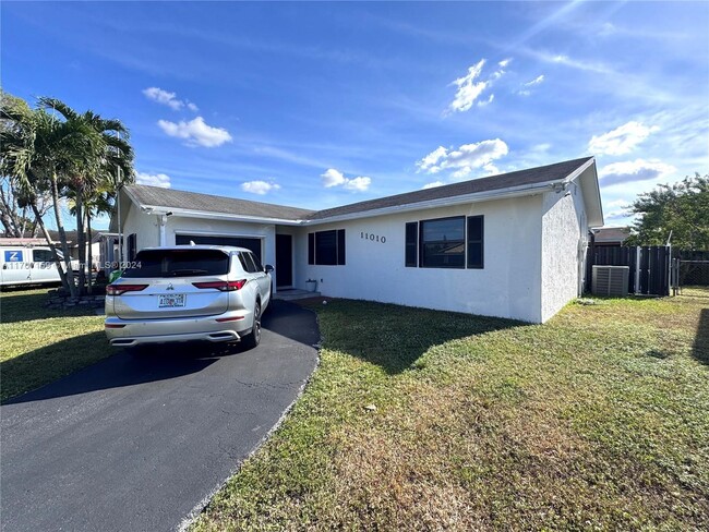 property at 11010 NW 24th Ct