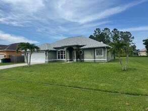 2461 SW Webster Ln in Port St. Lucie, FL - Building Photo - Building Photo