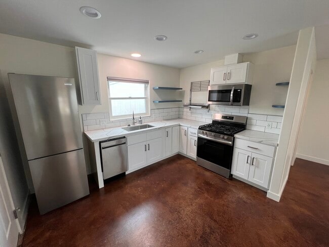 property at 5703 Adelaide Ave