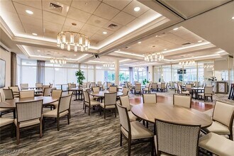 1511 Whispering Oaks Cir in Naples, FL - Building Photo - Building Photo
