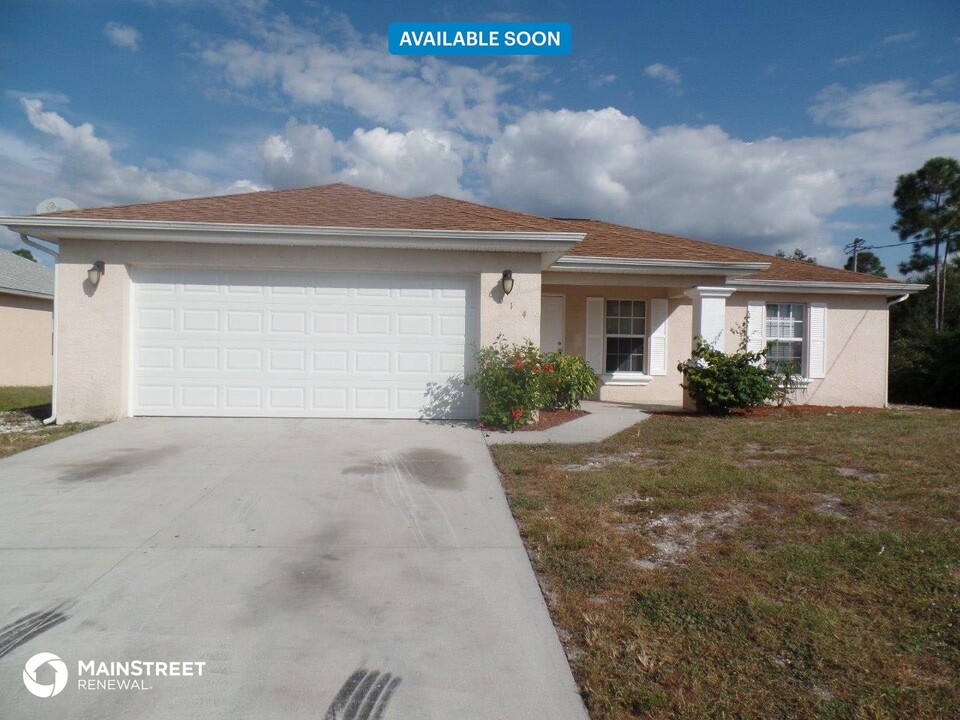 6014 Terry Ave N in Lehigh Acres, FL - Building Photo