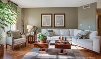 Enjoy spacious living rooms providing plenty of natural light and gas-burning fireplaces - Palazzo East Apartments in Los Angeles, California