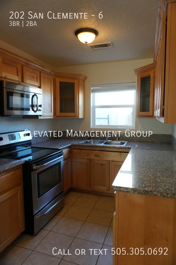 property at 202 San Clemente Ave NW