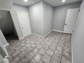 235 Spring St in Paterson, NJ - Building Photo