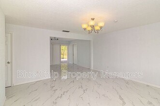 921 Burn Dr NE in Palm Bay, FL - Building Photo - Building Photo