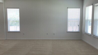 12712 Westside Vlg Lp in Windermere, FL - Building Photo - Building Photo