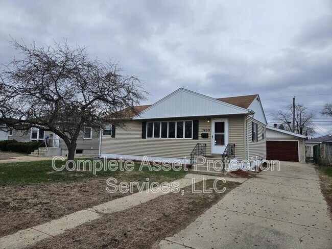 property at 7609 Missouri Ave