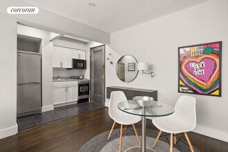 54 E 8th St in New York, NY - Building Photo - Building Photo