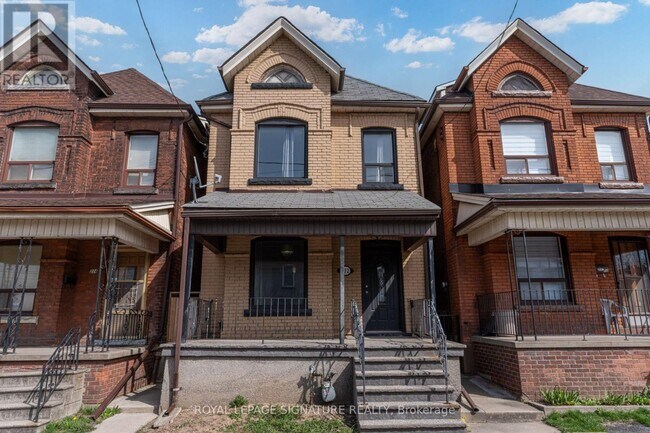 property at 212 Wellington St N