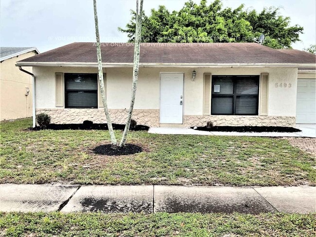 5493 Thurston Ave in Greenacres, FL - Foto de edificio - Building Photo