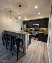 13160 Bella Casa Cir in Ft. Myers, FL - Building Photo - Building Photo