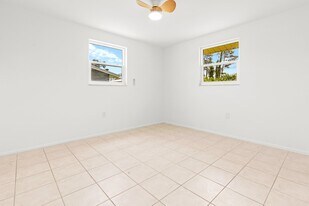 1057 Tropical Ave NW in Port Charlotte, FL - Building Photo