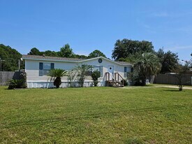 2242 Calle De Cantabria in Navarre, FL - Building Photo