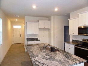 7980 Penrose Pl in Wildwood, FL - Building Photo - Building Photo