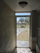 171 Americana Blvd NE in Palm Bay, FL - Foto de edificio - Building Photo