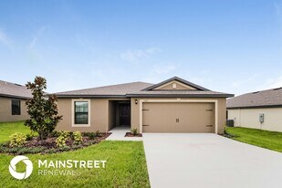 1467 Swan Lake Cir in Dundee, FL - Building Photo