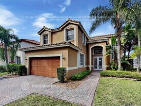 6111 NW 58th Way in Parkland, FL - Building Photo
