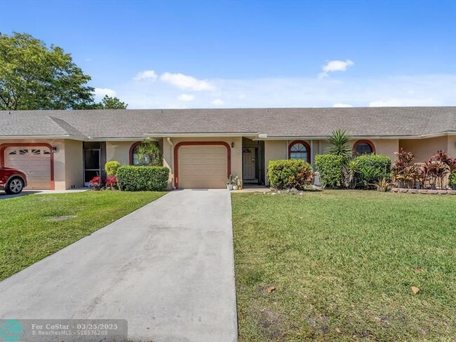 9779 NW 76th Ct in Tamarac, FL - Foto de edificio - Building Photo