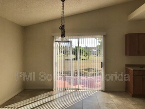 13339 Copper Ave in Port Charlotte, FL - Building Photo - Building Photo
