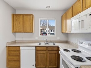 Spacious Townhome with Functional Layout in Evans, CO - Building Photo - Building Photo