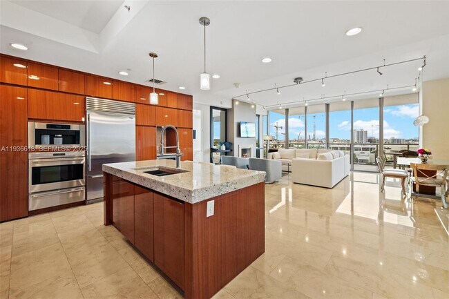property at 9705 Collins Ave