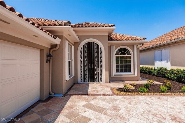 3949 Isla Ciudad Ct in Naples, FL - Building Photo - Building Photo