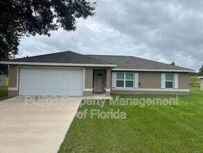 254 Malauka Run in Ocklawaha, FL - Building Photo - Building Photo