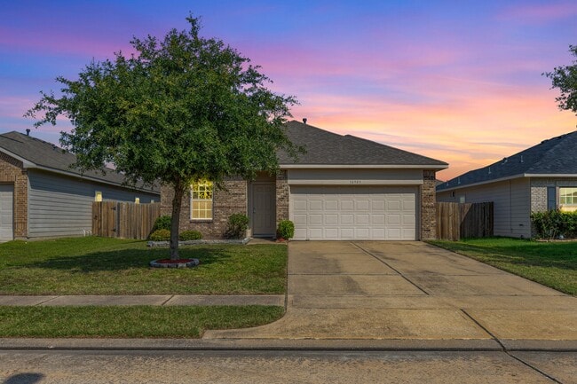 property at 10903 Woodwind Shadows Dr