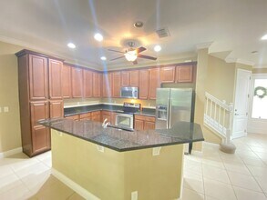 EAGLE CREEK (LAKE NONA) - 4BR/3.5BA TWO ST in Orlando, FL - Building Photo - Building Photo