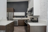 501 W Lexington St, Unit 301 in Baltimore, MD - Building Photo - Building Photo