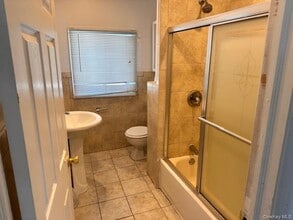 122 Cornelius St in Freeport, NY - Building Photo - Building Photo