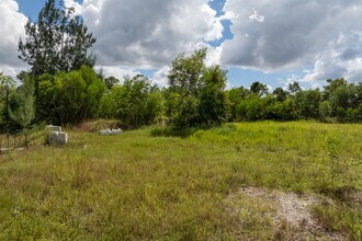 8260 Anglemoss Ct in Saint James City, FL - Building Photo - Building Photo