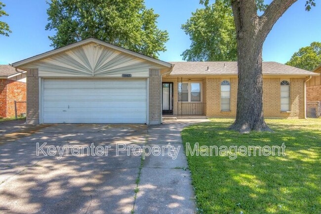 property at 11417 E 38th St