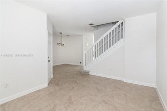 1027 NE 207th St in Miami, FL - Building Photo - Building Photo