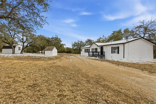 931 Sycamore Creek Dr in Dripping Springs, TX - Building Photo - Building Photo