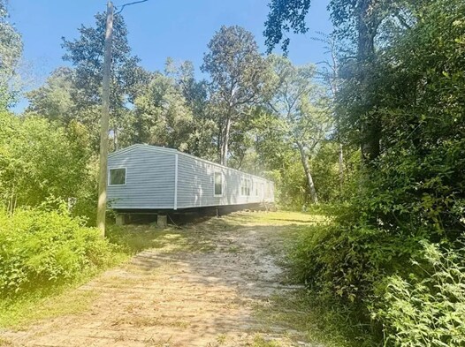 911 Little Ln in Shepherd, TX - Building Photo - Building Photo