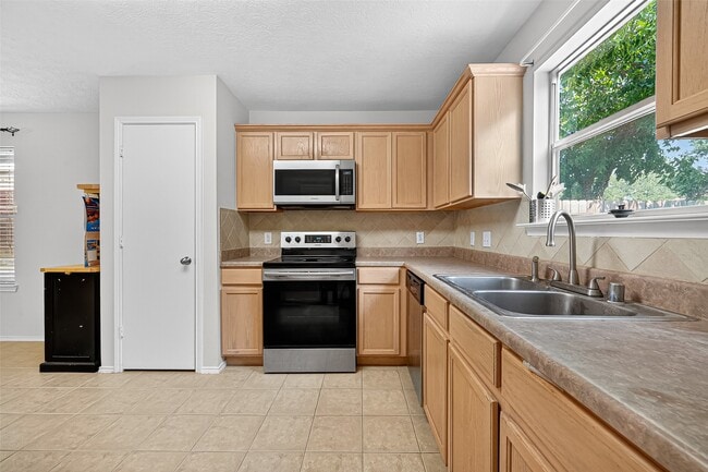 property at 11902 Rolling Stream Dr