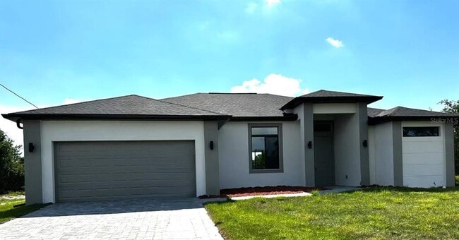 318 Radford Ave in Lehigh Acres, FL - Building Photo - Building Photo