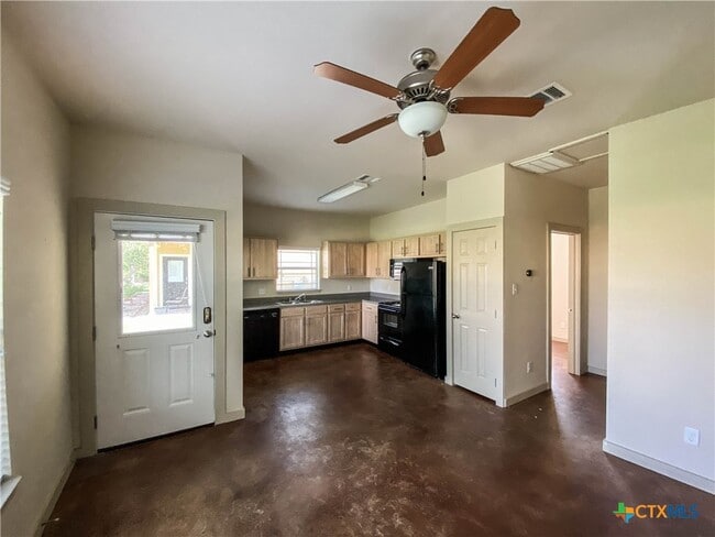 property at 1102 W 16th St