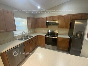 1453 Sugarberry Ln in St. Cloud, FL - Foto de edificio - Building Photo