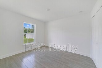 417 St Johns Ln in Poinciana, FL - Building Photo - Building Photo