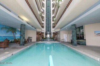 3013 S Atlantic Ave, Unit Ocean Atrium One in Daytona Beach, FL - Building Photo - Building Photo