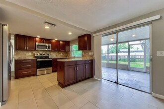 7750 Cayuga Dr in New Port Richey, FL - Building Photo - Building Photo