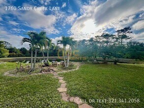 1760 Sandy Creek Ln in Malabar, FL - Building Photo - Building Photo