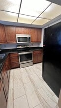 1524 SE Royal Green Cir, Unit 101 in Port St. Lucie, FL - Building Photo - Building Photo
