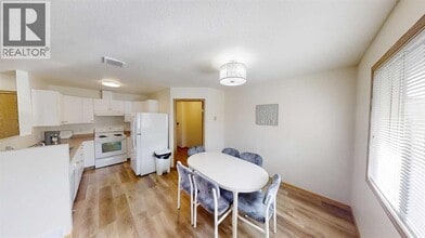 10605-10102 102 St in Grande Prairie, AB - Building Photo - Building Photo