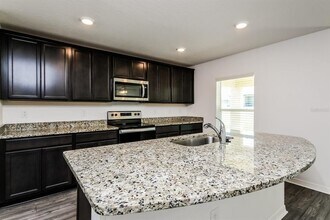 1387 Swan Lake Cir in Dundee, FL - Building Photo - Building Photo