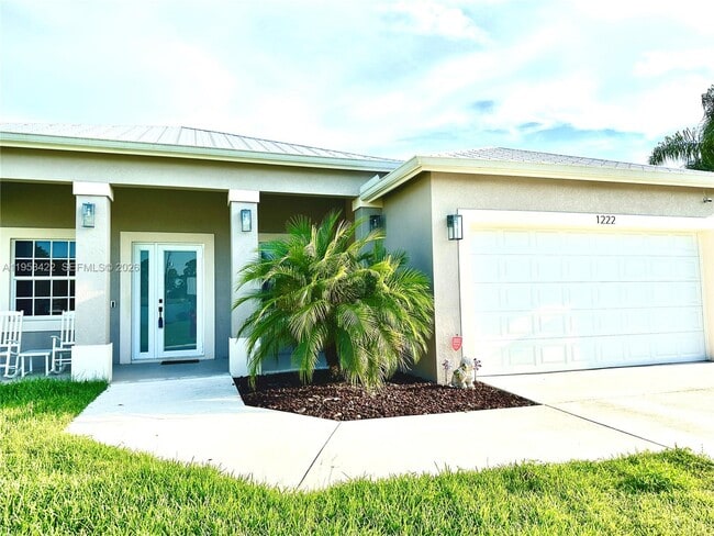 1222 SW Herald Rd in Port St. Lucie, FL - Building Photo - Building Photo